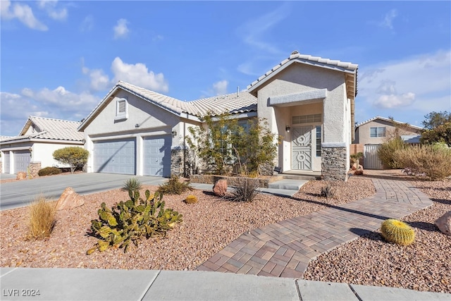 view of front of property featuring a garage