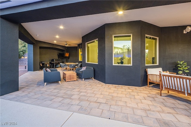 view of patio / terrace featuring outdoor lounge area and ceiling fan