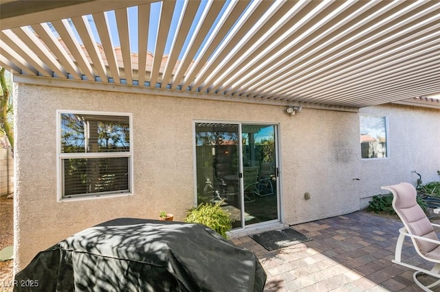 view of patio / terrace featuring a pergola