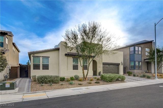 view of front of property with a garage