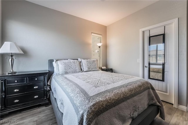 bedroom featuring hardwood / wood-style floors