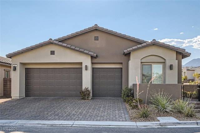 view of front of home with a garage