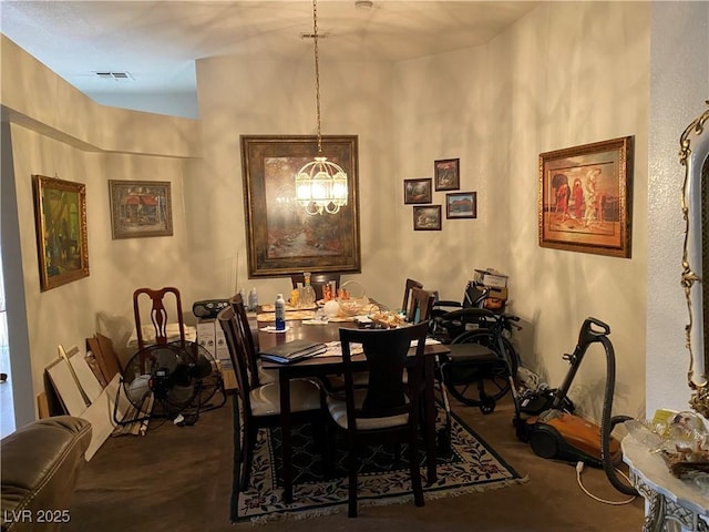 dining room featuring a chandelier