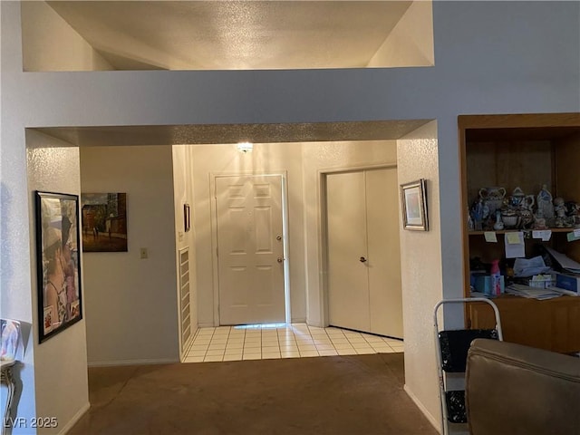 entrance foyer with light colored carpet