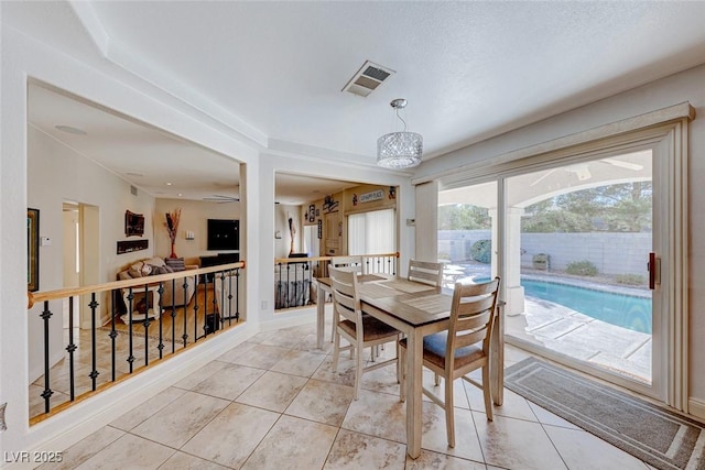 dining space with light tile patterned floors