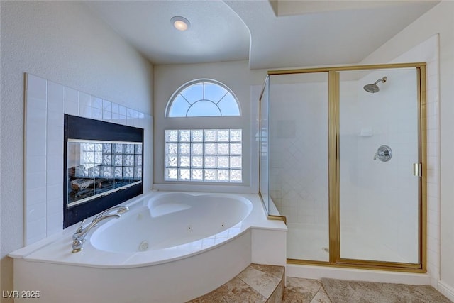 bathroom featuring plus walk in shower