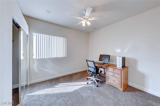 office with carpet flooring and ceiling fan