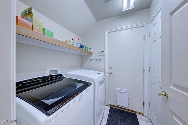 laundry area with washer and dryer