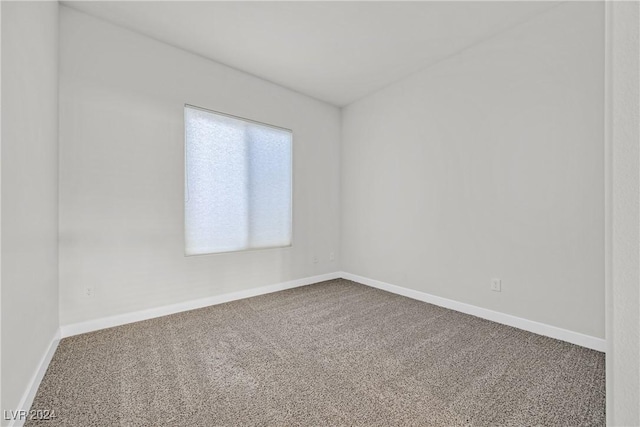 empty room featuring carpet floors