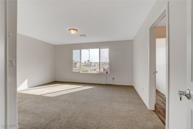 unfurnished room with carpet