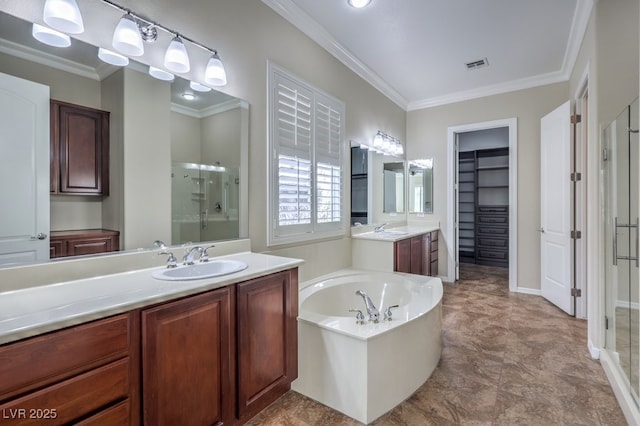 bathroom with vanity, crown molding, and shower with separate bathtub