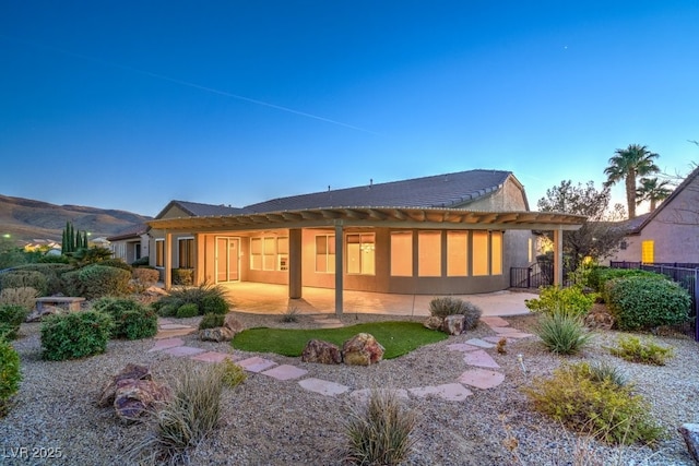 back of house with a patio area