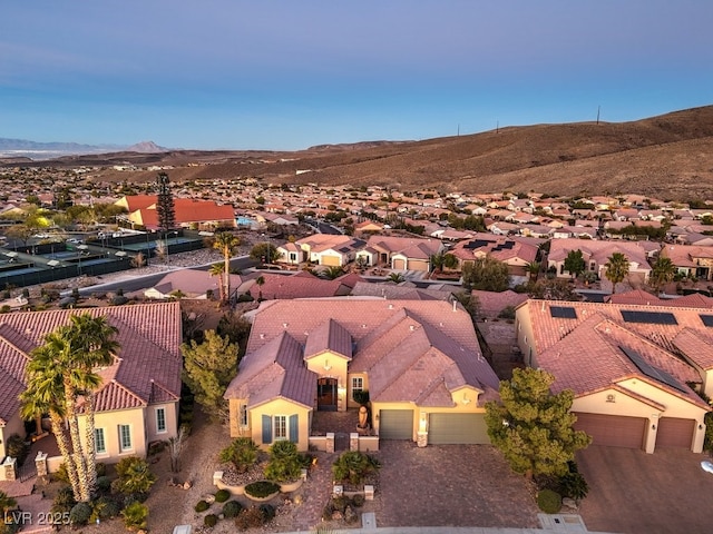 bird's eye view with a mountain view