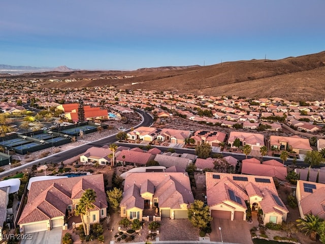 bird's eye view with a mountain view