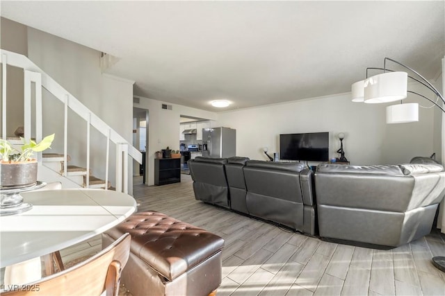 living room with light hardwood / wood-style floors