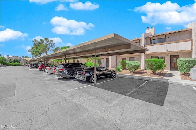 view of car parking featuring a carport