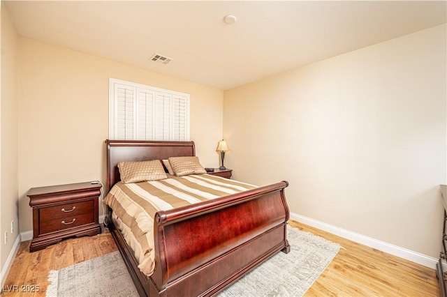 bedroom featuring light hardwood / wood-style flooring