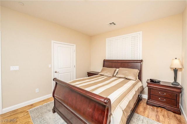 bedroom with light hardwood / wood-style flooring