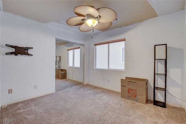 empty room with light colored carpet