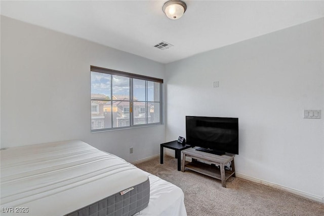 bedroom featuring carpet