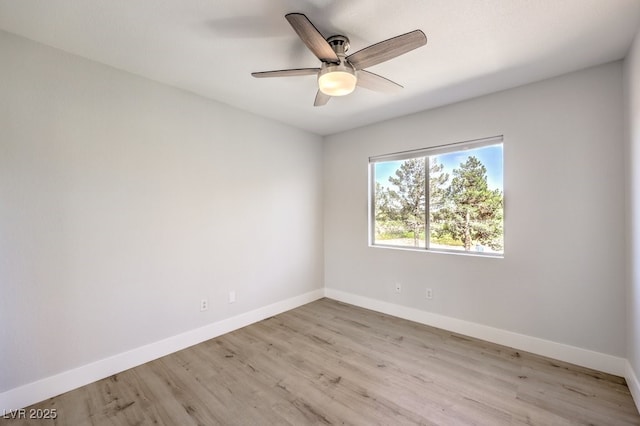 unfurnished room featuring ceiling fan and light hardwood / wood-style floors