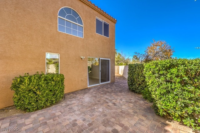 back of house with a patio area