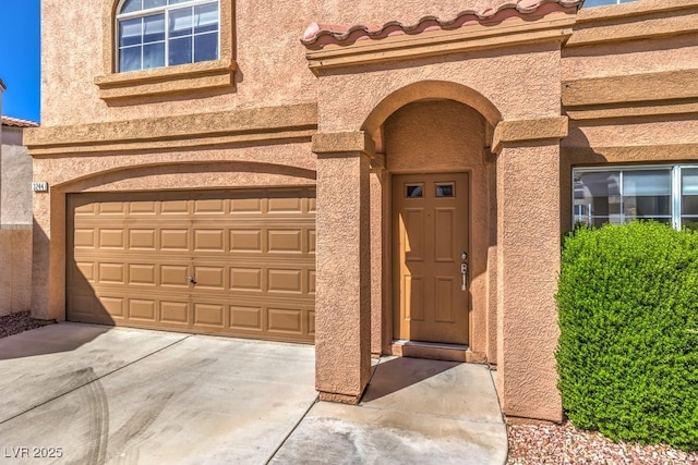 entrance to property with a garage