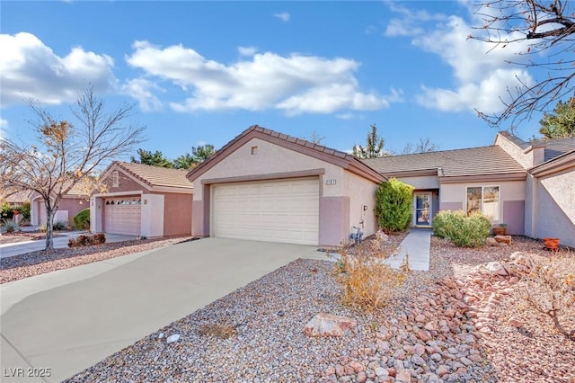 ranch-style home featuring a garage