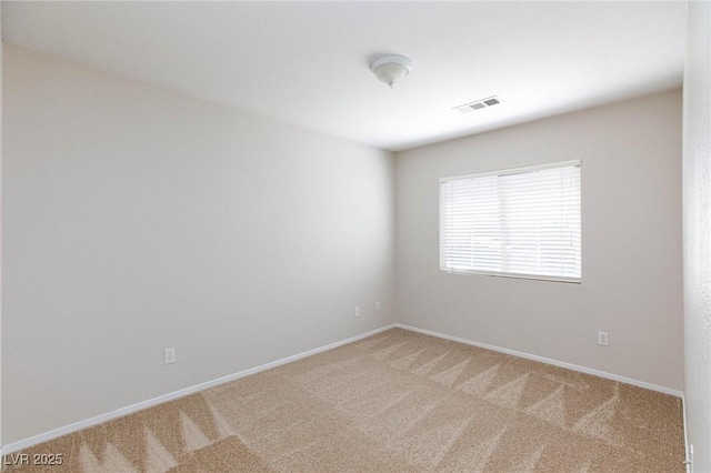 empty room featuring carpet floors