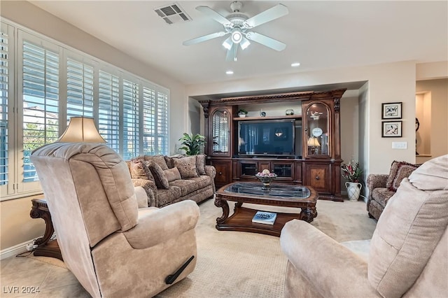 living room featuring ceiling fan