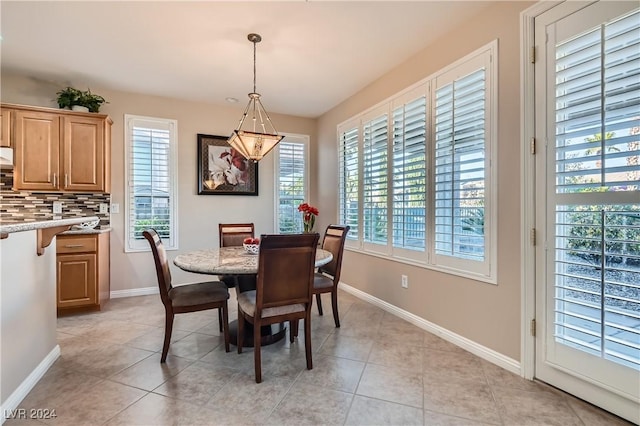 dining room featuring light tile patterned floors