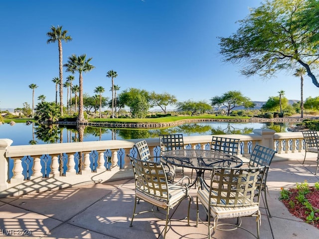 view of patio / terrace featuring a water view