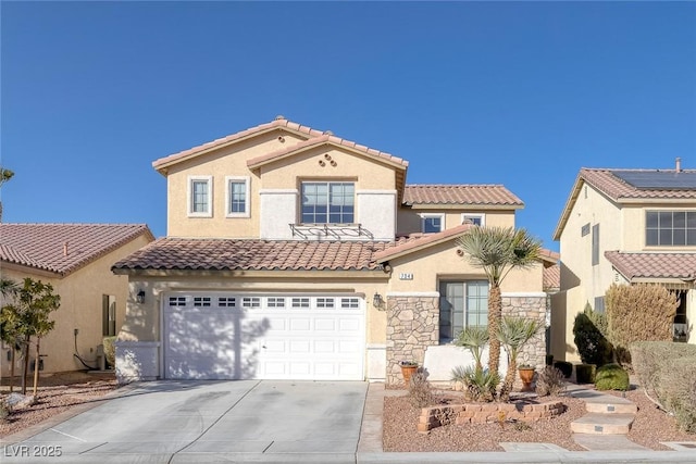 mediterranean / spanish-style house featuring a garage