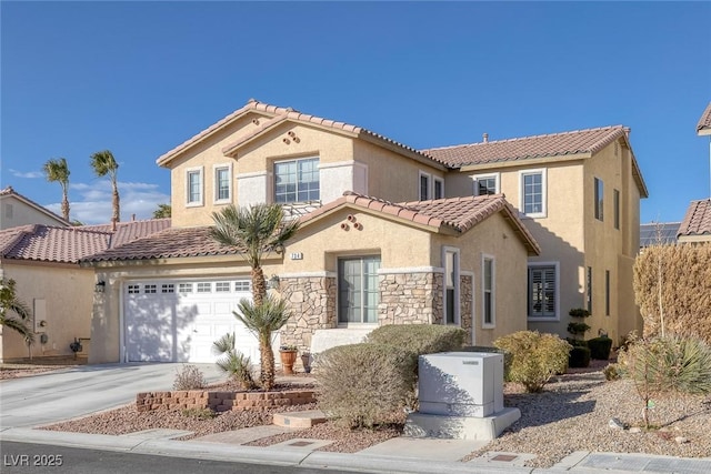 mediterranean / spanish-style house featuring a garage