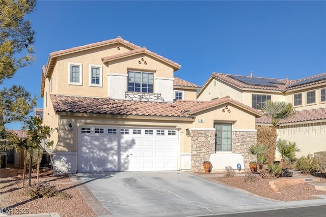 mediterranean / spanish-style house with solar panels and a garage