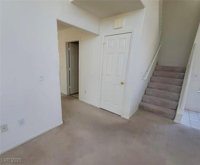 interior space with light colored carpet