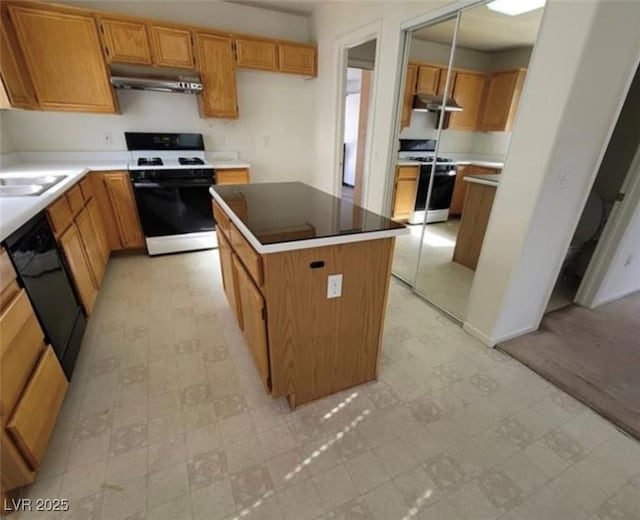 kitchen with black dishwasher, a kitchen island, white gas stove, and sink