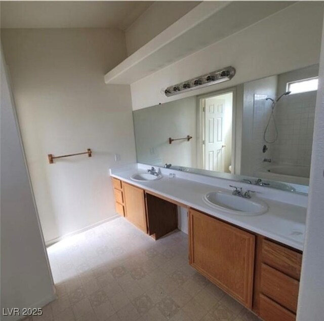 bathroom with vanity and tub / shower combination