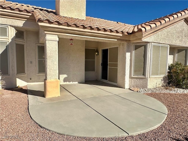 back of house with a patio area