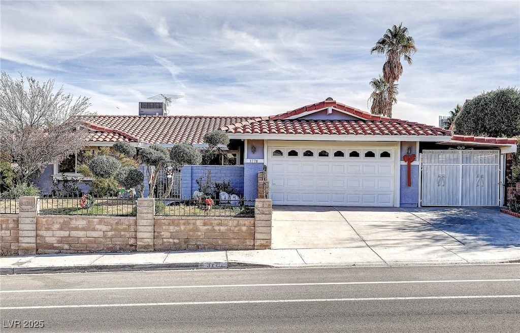 view of front of property with a garage