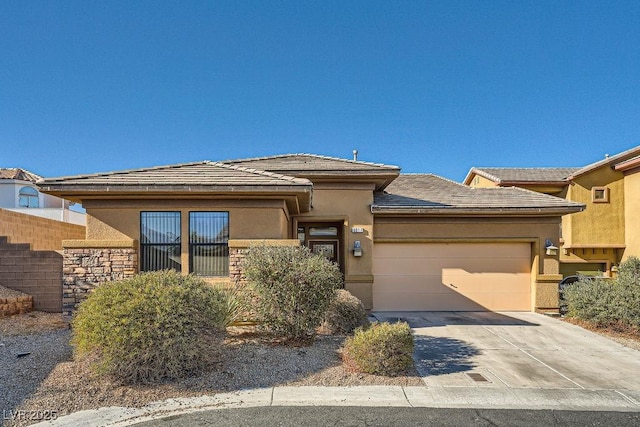 prairie-style home featuring a garage