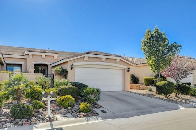 view of front of property with a garage