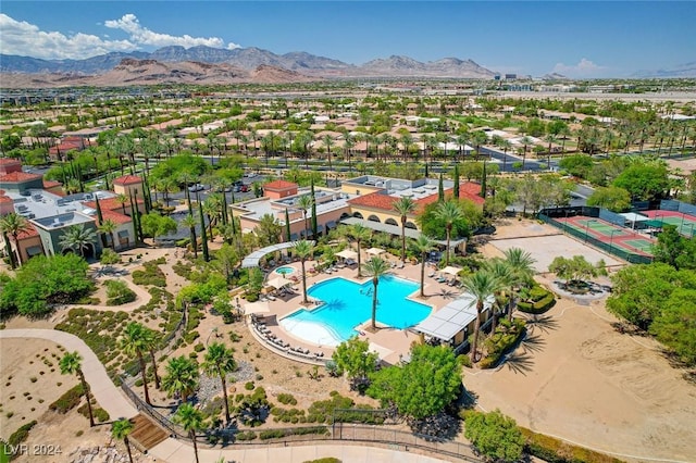 birds eye view of property with a mountain view