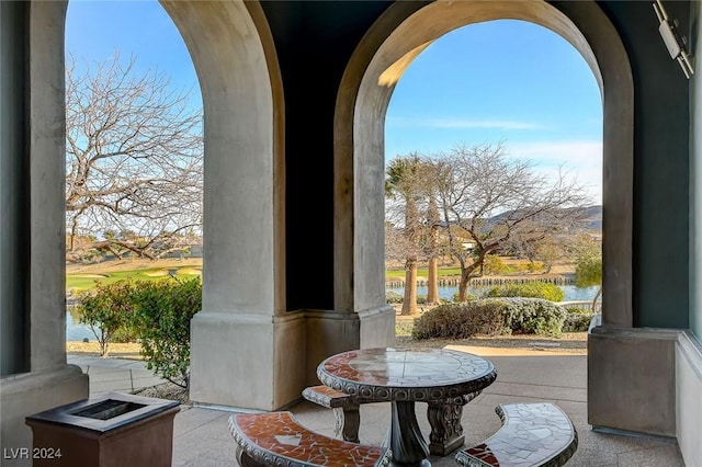 view of patio / terrace with a water view