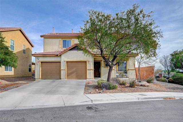 view of front of property with a garage