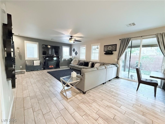 living room with ceiling fan