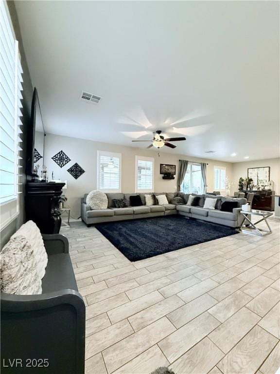 living room with ceiling fan