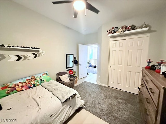 bedroom with ceiling fan and a closet