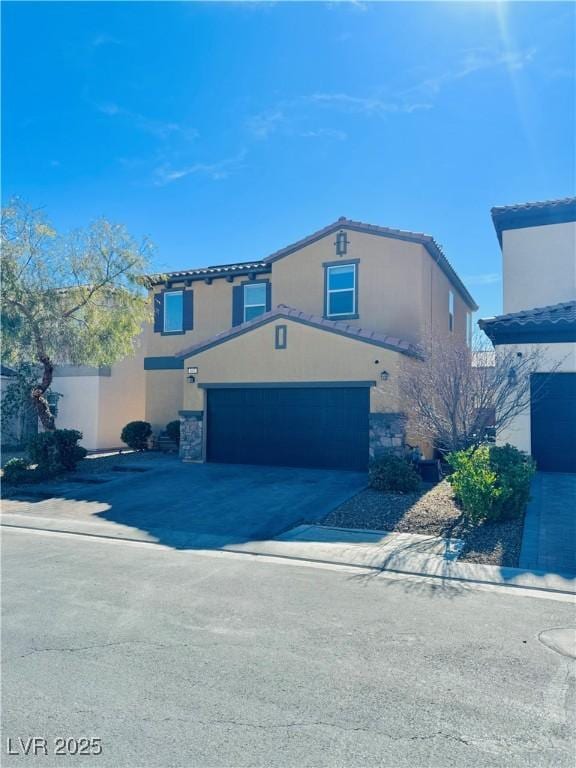 view of front of property with a garage