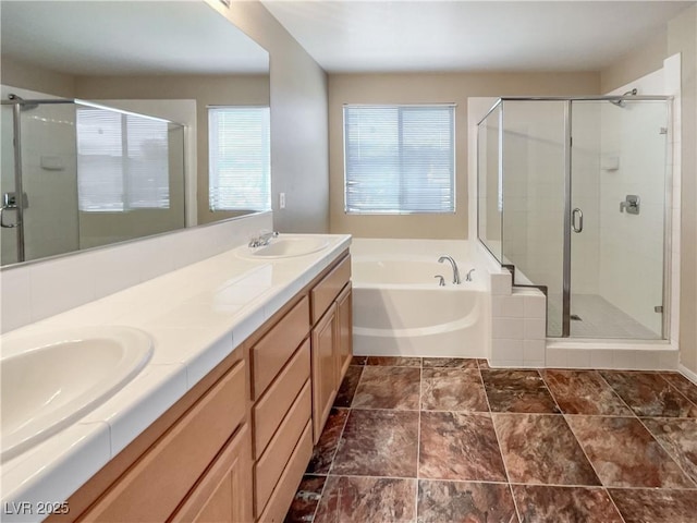 bathroom featuring vanity and shower with separate bathtub